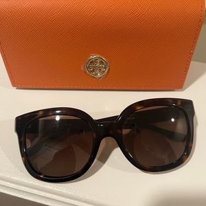 Tory Burch sunglasses.